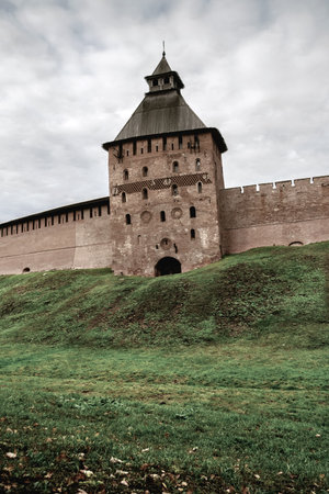 Brick fortress tower of an ancient Russian fortress. Architecture, history, exterior