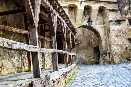 Arch and Wooden Rails In Sighisoara, Romania.の写真素材