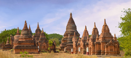 Around 12 Small Reddish Stupa Grouping in Bagan, Myanmar Panoramaの写真素材