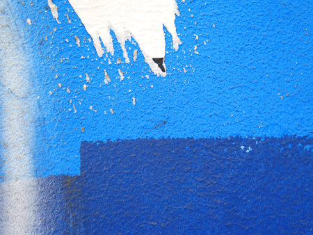 Aged street wall background with colorful paint splashesの写真素材