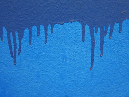 Aged street wall background with colorful paint splashesの写真素材