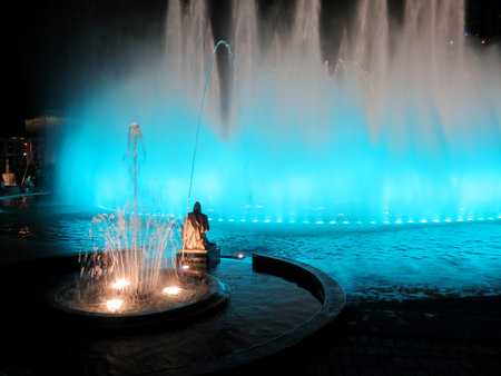 Illuminated colorful fountains at nightの写真素材