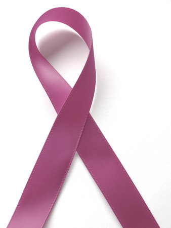 Pink ribbon against cancer isolated on white background. Clipping Path includedの写真素材