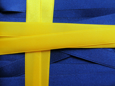 SWEDEN flag or banner made with blue and yellow ribbonsの写真素材