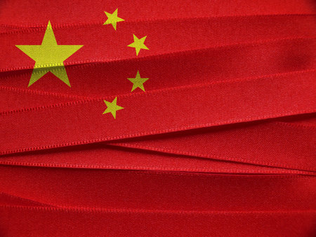 China flag or banner made with red and yellow ribbonsの写真素材