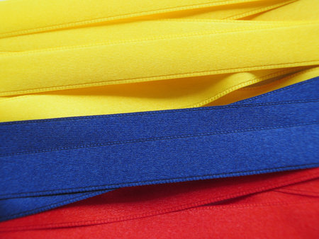 Colombia flag or banner made with Yellow, blue and red ribbonsの写真素材