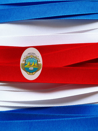 Costa Rica flag or banner made with red, blue and white ribbonsの写真素材