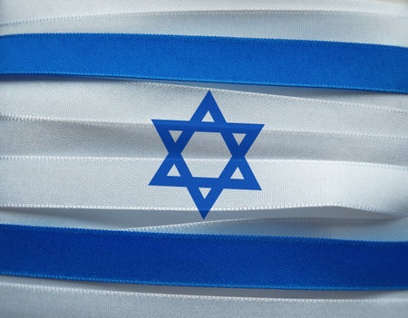 Israel flag or banner made with blue and white ribbonsの写真素材