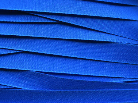 Shiny blue satin ribbon background