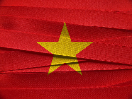Vietnam flag or banner made with red ribbonsの写真素材