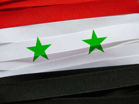 Syria flag or banner made with red, white and black ribbonsの写真素材