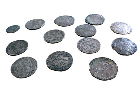 Old medieval coins isolated over white backgroundの写真素材