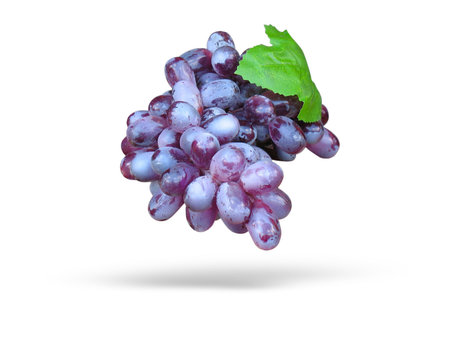 Pink grape with leave and shadow isolated over white backgroundの写真素材