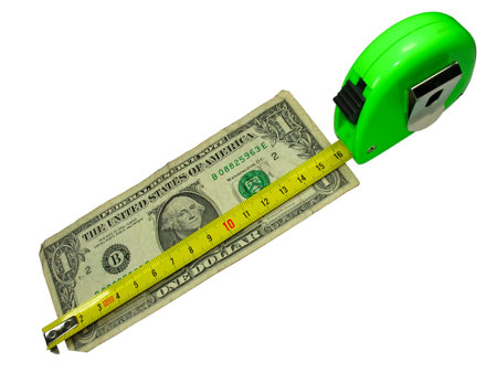 crisis: measuring tape over us dollar currency isolated on whiteの写真素材
