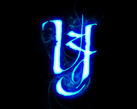 Blue flame magic font over black background. Letter Yの写真素材