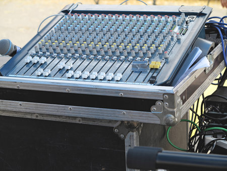 Closeup of the sound mixer control console.