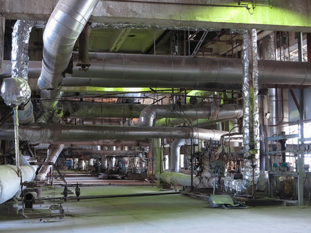 steam turbine, machinery, pipes, tubes at an power plantのeditorial素材