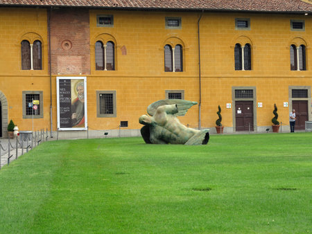 14.06.2017, Pisa, Italy:Statue of fallen angel by Igor Mitoraj on Square of Miracles, Toscanaのeditorial素材