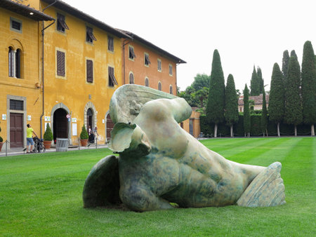 14.06.2017, Pisa, Italy:Statue of fallen angel by Igor Mitoraj on Square of Miracles, Toscanaのeditorial素材