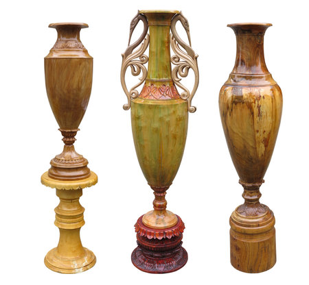 Beautiful brown wooden vase isolated over white backgroundの写真素材