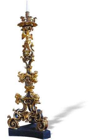 Vintage bronze antique candlestick with rich and sophisticated decoration isolatedの写真素材