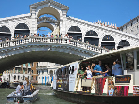 20.06.2017, Venice, Italy: View from gondola to Rialto Bridge and canalsのeditorial素材