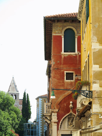 Vintage window and detail of a classical building in the historical center of Venezia, Italyのeditorial素材