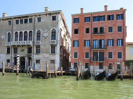 20.06.2017, Venice, Italy: View from gondola to historic buildings and canalsのeditorial素材