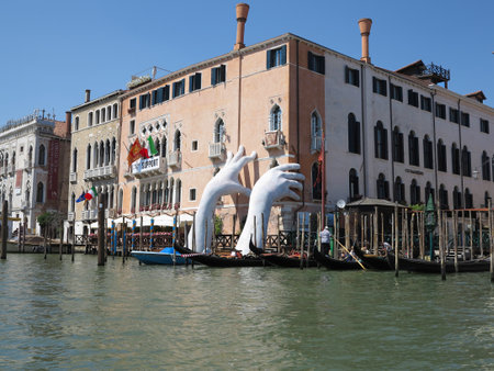 20.06.2017, Venice, Italy: View from gondola to historic buildings and canalsのeditorial素材