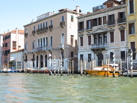 20.06.2017, Venice, Italy: View from gondola to historic buildings and canalsのeditorial素材