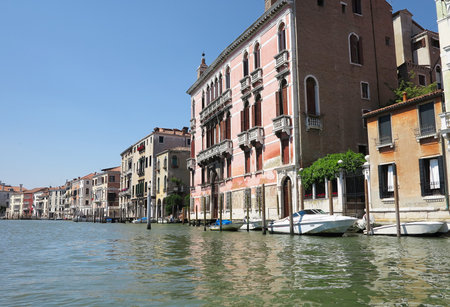 20.06.2017, Venice, Italy: View from gondola to historic buildings and canalsのeditorial素材