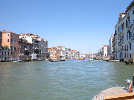 20.06.2017, Venice, Italy: View from gondola to historic buildings and canalsのeditorial素材