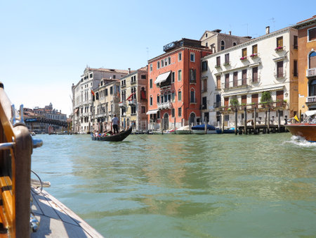 20.06.2017, Venice, Italy: View from gondola to historic buildings and canalsのeditorial素材