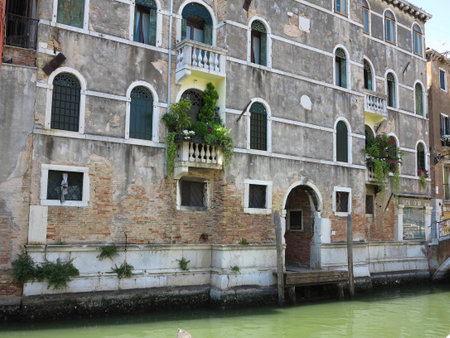 Vintage window and detail of a classical building in the historical center of Venezia, Italyのeditorial素材