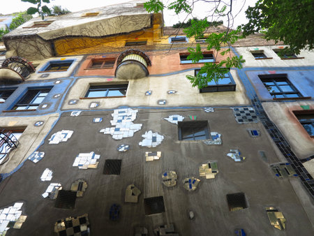 26.05.2018, Vienna, Austria: Hundertwasser House is one of the most Vienna's architectural highlights, art and vintage shopping zone combine with a bar, restaurant and numerous souvenir storesのeditorial素材