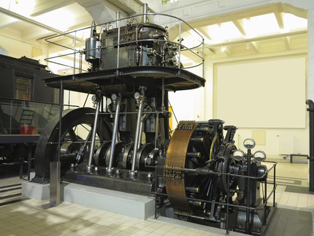 26.05.2018, Wien, Austria: Giant old steam engine with electric power generator in Vienna technical museumのeditorial素材