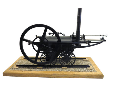 Model of old-fashioned steam engine train isolated over white backgroundの写真素材