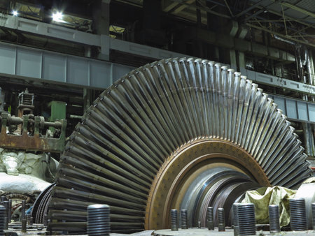 Disassembled steam turbine in the process of repairing an electric generator at a power plantの写真素材