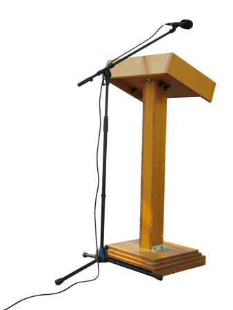 Wooden podium tribune stand rostrum with microphone isolated over white backgroundの写真素材