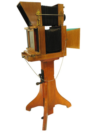 Vintage antique wooden old photo camera isolated over white backgroundの写真素材