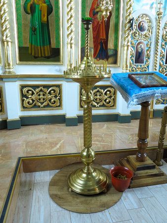 Vintage golden candlestick in the old orthodox churchのeditorial素材