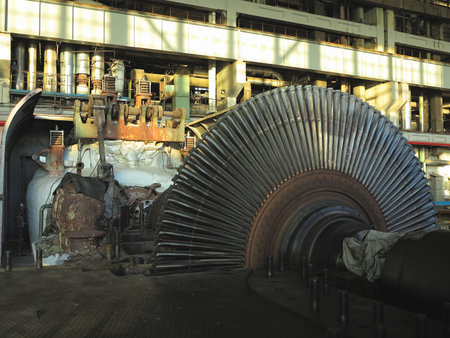 Disassembled steam turbine in the process of repairing an electric generator at a power plantのeditorial素材