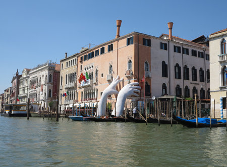 20.06.2017, Venice, Italy: View from gondola to historic buildings and canalsのeditorial素材