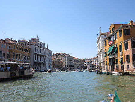 20.06.2017, Venice, Italy: View from gondola to historic buildings and canalsのeditorial素材