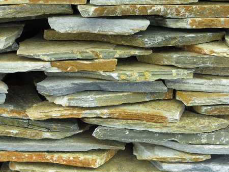 Abstract vintage old chipped stone wall background textureの写真素材