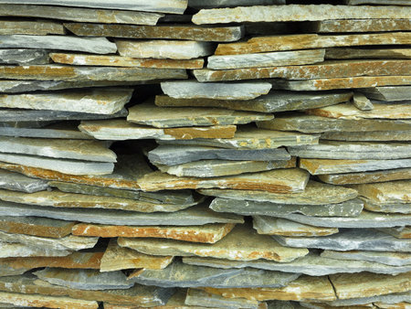 Abstract vintage old chipped stone wall background textureの写真素材