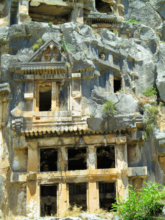 Ancient lycian Myra rock tomb ruins in Demre, Antalya, Turkeyの写真素材