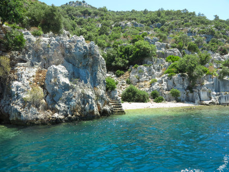 The sunken ruins on the island of Kekova Dolichiste of the ancient Lycian city of ancient Simena, was destroyed by an earthquake, rebuilt and existed until the Byzantine era. Antalya, Turkey.の写真素材