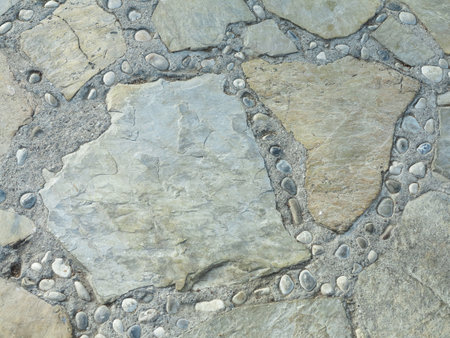 Background texture of ancient round gray stone floor .の写真素材