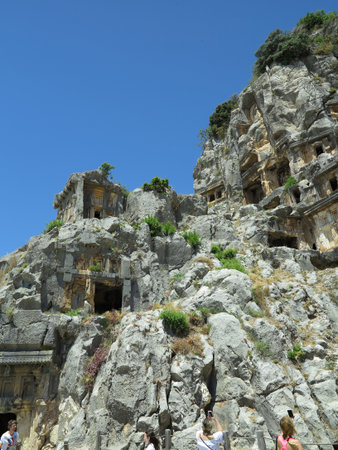Ancient lycian Myra rock tomb ruins in Demre, Antalya, Turkeyの写真素材
